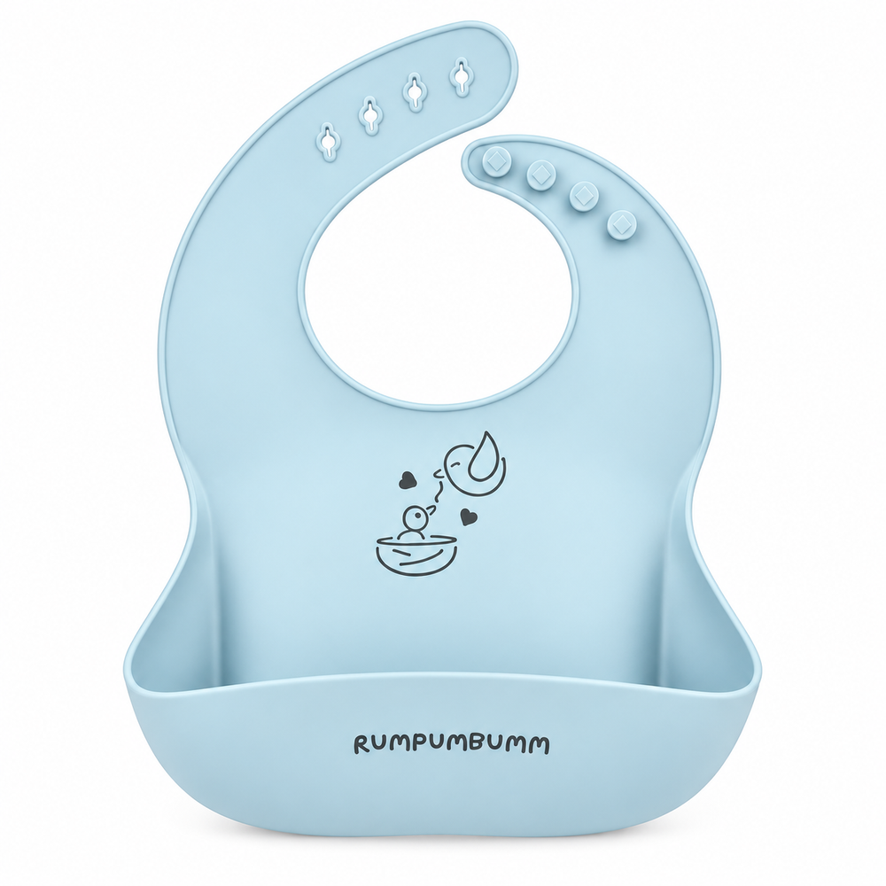 In the set: Food Catching Bib in Ice Blue, front, showing the food-catching pocket